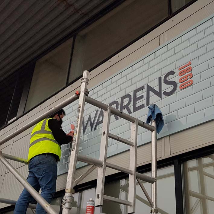 Installation of Warrens Bakery Signs in Devon